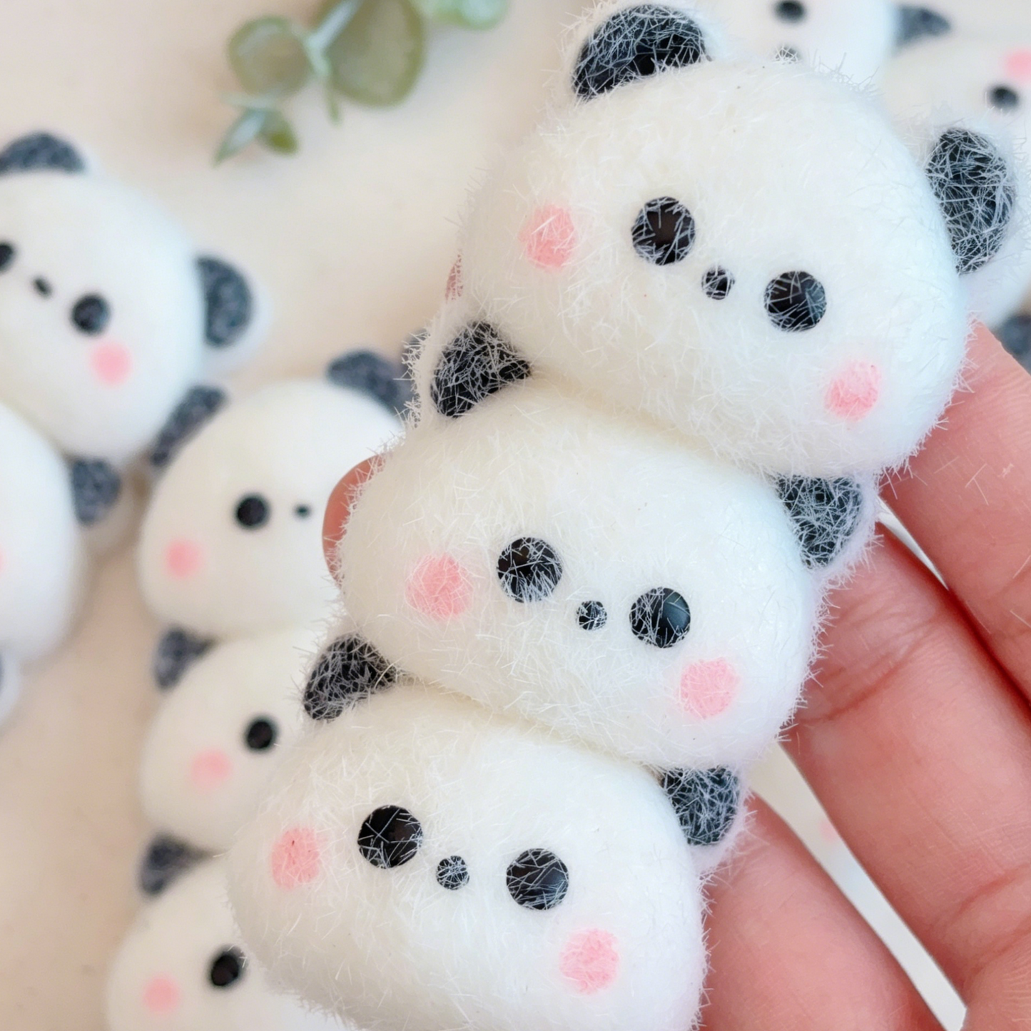 Three-piece panda stress-relief toy